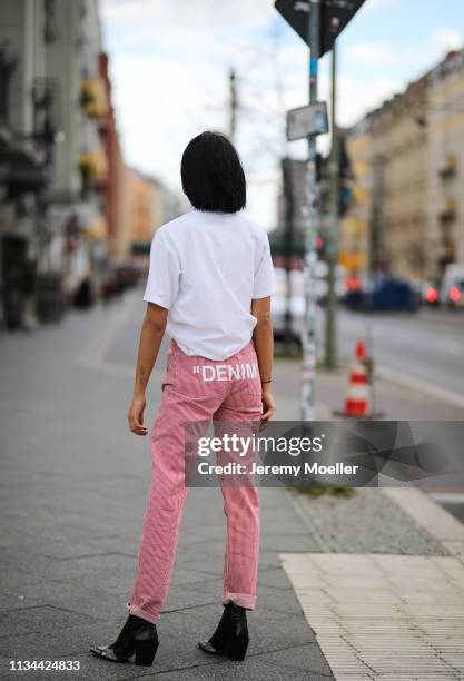 Anuthida Ploypetch wearing an Acne Studios shirt, Off White jeans on March 07, 2019 in Berlin, Germany.