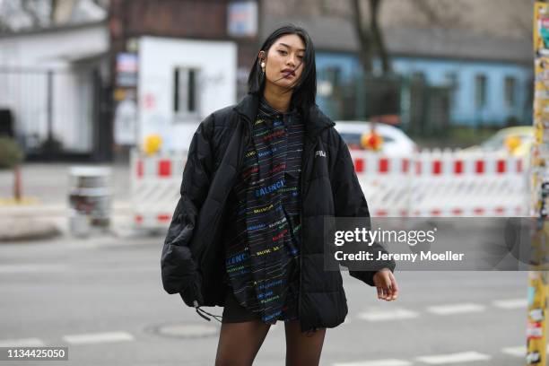 Anuthida Ploypetch wearing a Balenciaga shirt and Buffalo shoes on March 07, 2019 in Berlin, Germany.