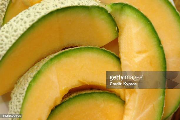 europe, germany, bavaria, munich: view of honeydew melon slices - honeydew melon stock pictures, royalty-free photos & images
