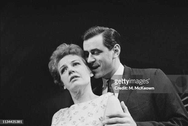 English actress Phyllis Calvert and George Baker on the set of 'Portrait of murder', UK, 23rd October 1963.