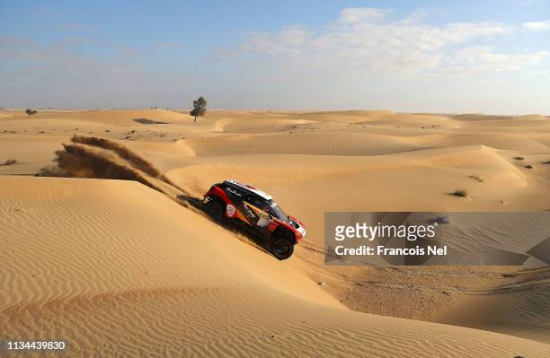 Peugeot 3008 DKR driven by Khalid Al Qassimi of UAE and Xavier Panseri of FRance compete during the Dubai International Baja 2019 on March 08, 2019...