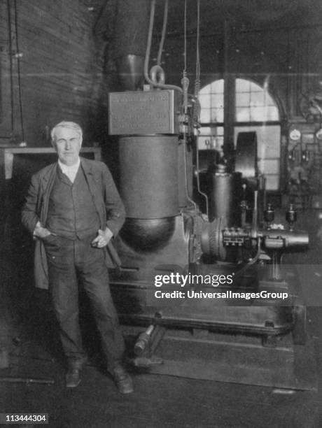 Thomas Alva Edison American inventor, with his first dynamo for producing electric light.