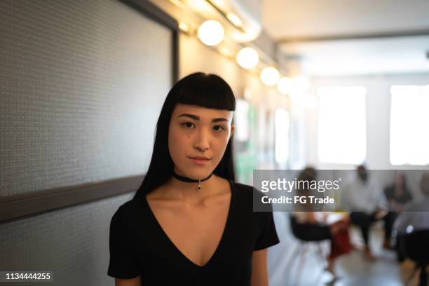 japanese ethnicity woman portrait at startup modern office - female founder stock pictures, royalty-free photos & images