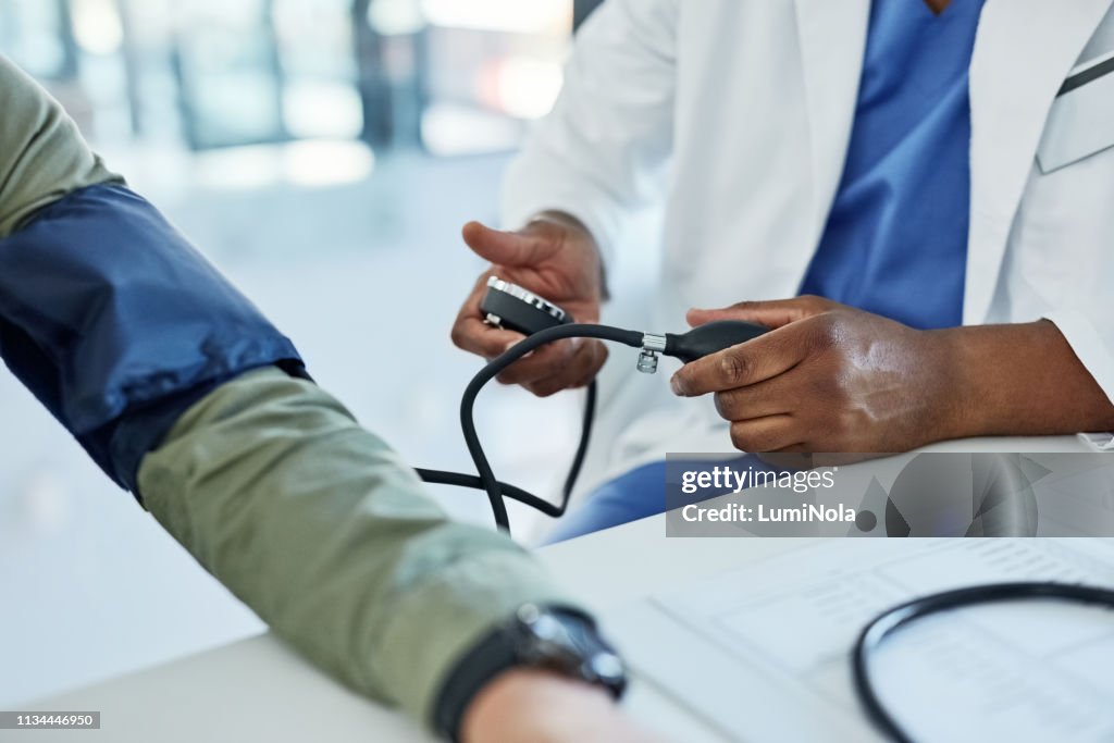 Doctor Routine Checkup Its All Part Of A Routine Checkup High-Res Stock Photo - Getty Images