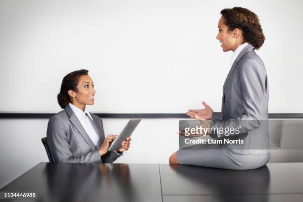 businesswomen in office, multiple image - multiple images of the same woman stock pictures, royalty-free photos & images