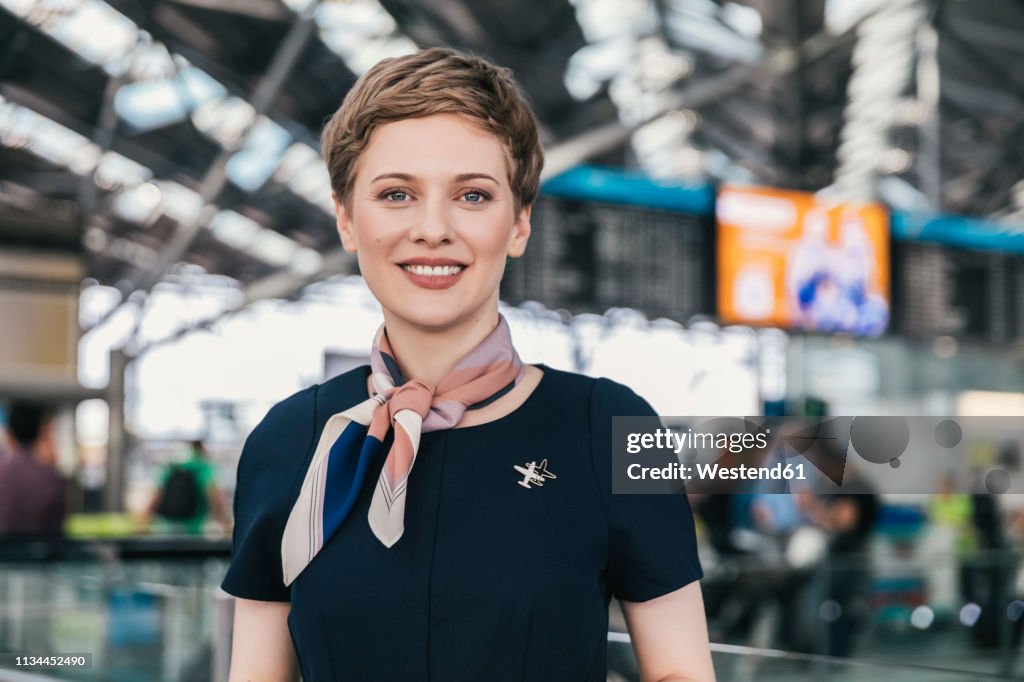 Portrait of smiling airline employee at the airport