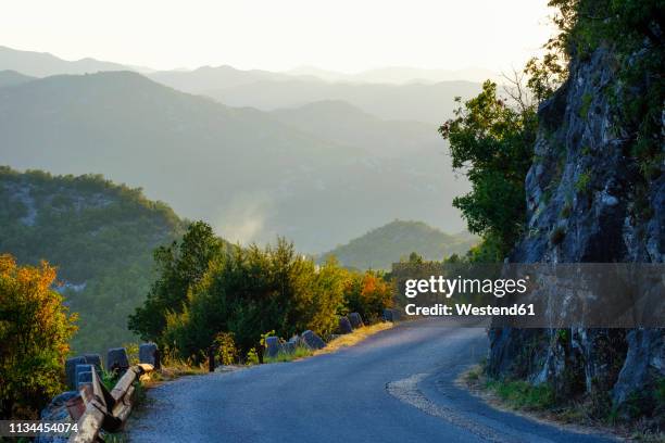 montenegro, mountain road near rijeka crnojevica - cetinje stock pictures, royalty-free photos & images