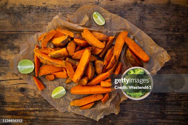 sweet potato wedges with avocado dip - cheese wedge foto e immagini stock