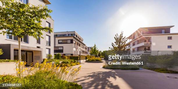 germany, ludwigsburg, residential area with modern multi-family houses - multi devices stockfoto's en -beelden