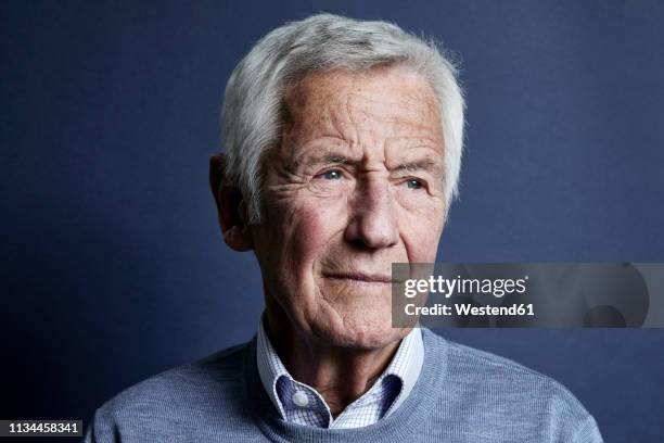 portrait of pensive senior man - brood stock pictures, royalty-free photos & images