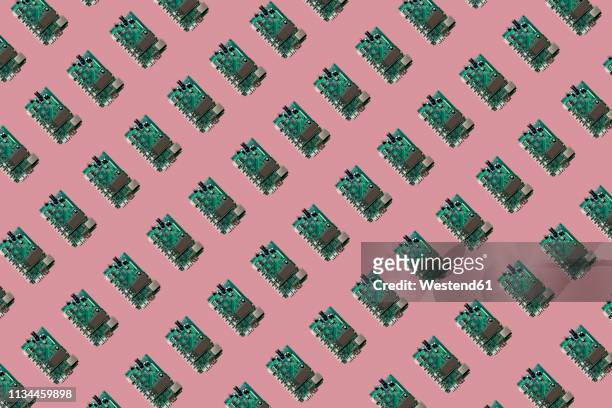 3d illustration, row of motherboards, pink background - repetition stock-grafiken, -clipart, -cartoons und -symbole