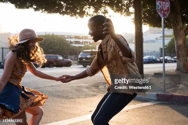 happy young couple outdoors - street dancers stock pictures, royalty-free photos & images