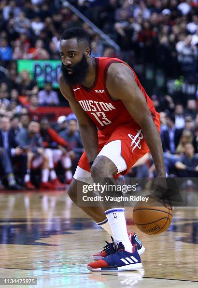 Harden Rockets James Harden of the Houston Rockets dribbles the ball during the ...
