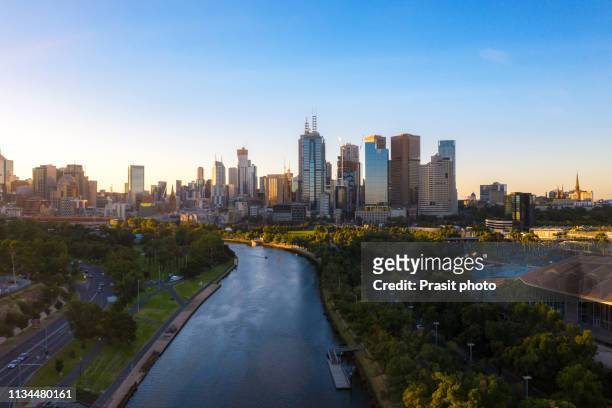 aerial view of melbourne cbd during sunset  in victoria, australia. - melbourne skyline stock pictures, royalty-free photos & images