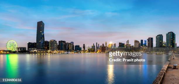 docklands waterfront during sunrise in melbourne, victoria, australia. - docklands stadium melbourne stock pictures, royalty-free photos & images
