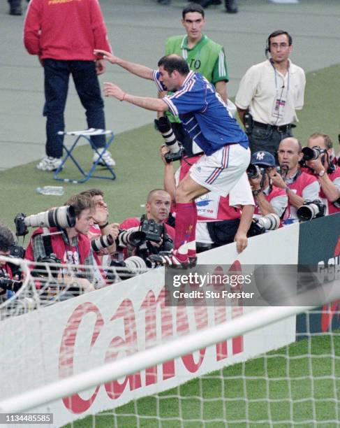 France player ‎Zinedine Zidane celebrates after scoring the first France goal during the 1998 FIFA World Cup Final between France and Brazil at the...