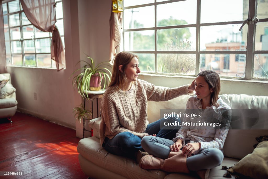 Mother and daughter having a talk.