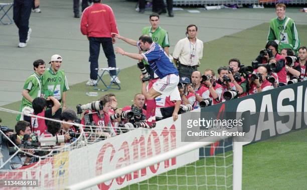 France player ‎Zinedine Zidane celebrates after scoring the first France goal during the 1998 FIFA World Cup Final between France and Brazil at the...