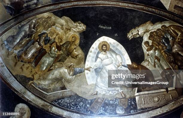 Anastasis, fresco in the parekklesion of Church of Christ in Chora Constantinople , Turkey . Christ, surrounded by mandorla, helps Adam and Eve from...