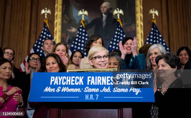 Actress Michelle Williams speaks during the Democratic Womens Caucus press conference marking Equal Pay Day and celebrating passage of the Paycheck...