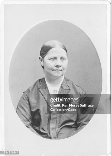 Cabinet photo with a portrait, from the waist up, of suffragist and abolitionist Lucy Stone, with a relaxed expression on her face, photographed by...