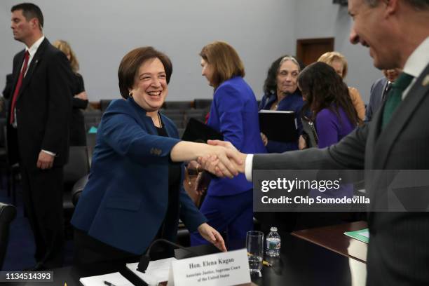 Supreme Court Associate Justice Elana Kagan shakes hands with Rep. Matt Cartwright after a hearing about the court's budget during a hearing of the...