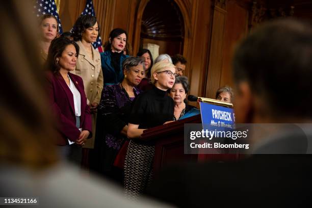 Actress Michelle Williams, center, speaks during a news conference for Equal Pay Day in Washington, D.C., U.S., on Tuesday, April 2, 2019. Women in...