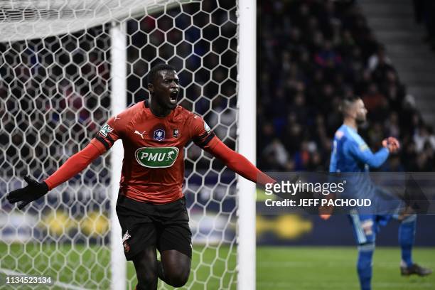 Rennes' Senegalese forward M'Baye Niang celebrates after scoring a goal during the French Cup semi-final football match between Lyon and Rennes at...