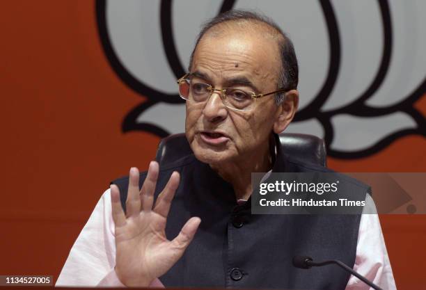 Union Finance Minister and BJP leader Arun Jaitley addresses a press conference to react on Congress party manifesto, at BJP headquarters on April 2,...