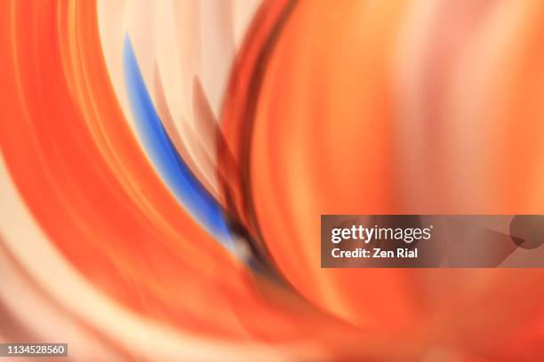 abstract image of a vibrant orange colored glass vase - filter premium stock pictures, royalty-free photos & images