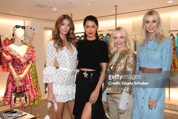 Lorena Rae, Rebecca Mir, Janin Ullmann, Lena Gercke attend the opening of the Michael Kors store on April 2, 2019 in Munich, Germany.