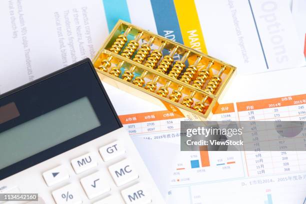 statements and calculator - gold abacus stock pictures, royalty-free photos & images