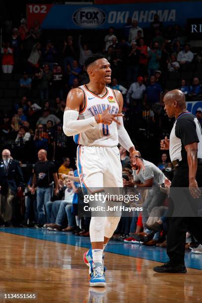 Russell Westbrook of the Oklahoma City Thunder reacts after joining NBA Legend Wilt Chamberlain as the 2nd player to record a 20/20/20 game in NBA...