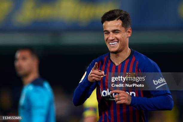 Coutinho of Barcelona celebrates after scoring his sides first goal during the La Liga match between Villarreal CF and FC Barcelona at Estadio de la...