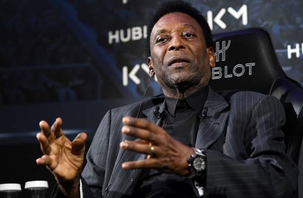 Brazilian football legend Pele take part in a meeting with Paris Saint-Germain and France national football team forward Kylian Mbappe at the Hotel...