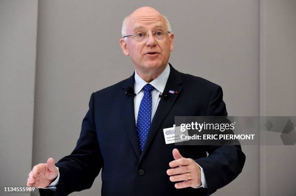 Of French insurance group AG2R-La Mondiale Andre Renaudin gestures as he speaks during a press conference to present the group's 2018 results in...