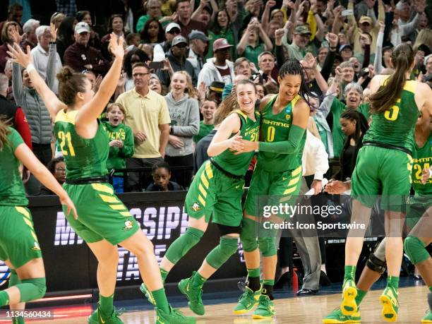 Oregon Ducks guard Sabrina Ionescu reacts with her teammate Oregon Ducks forward Satou Sabally after the NCAA Division I Women's Championship Elite...