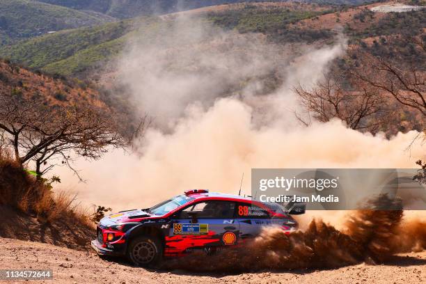 Andreas Mikkelsen of Norway and Anders Jaeger of Norway compete in their Hyundai Shell Mobis World Rally Team during day one of the FIA World Rally...