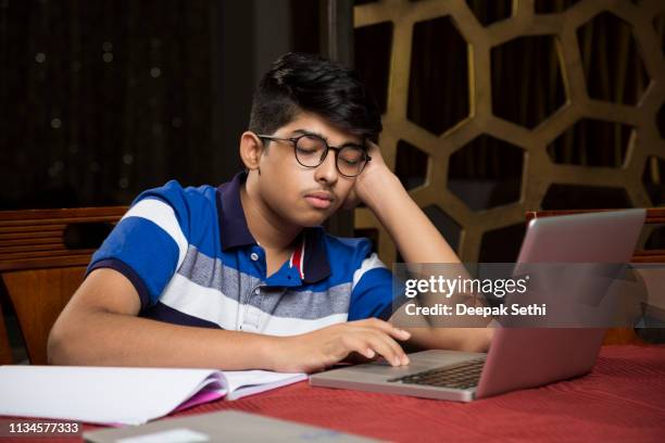 teeanger boy - stock images - concentration stock pictures, royalty-free photos & images