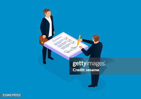 Dos empresarios firmando documentos Dos empresarios firmando documentos