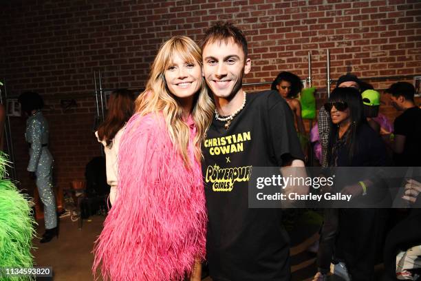 Heidi Klum and Designer Christian Cowan attends Christian Cowan x The Powerpuff Girls Runway Show at City Market Social House on March 08, 2019 in...