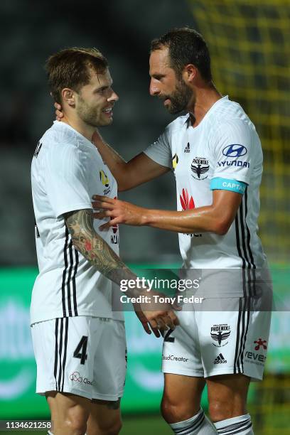 Mandi Sosa of Wellington Phoenix celebrates a goal with team mate Andrew Durante during the round 21 A-League match between the Central Coast...