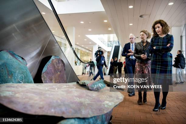 Dutch minister of Culture Ingrid van Engelshoven stands in front of copper plates from a ship wreck from 1536 that was discovered during the storage...