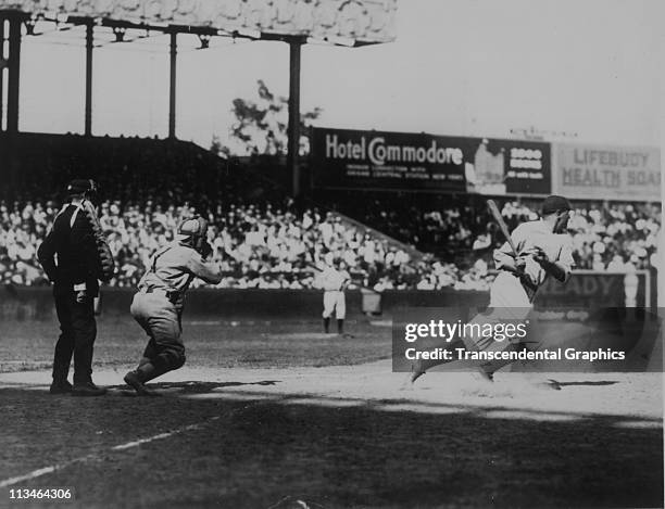 Babe Ruth, hits a home run during a home contest circa the 1922 in the Polo Grounds in New York City.