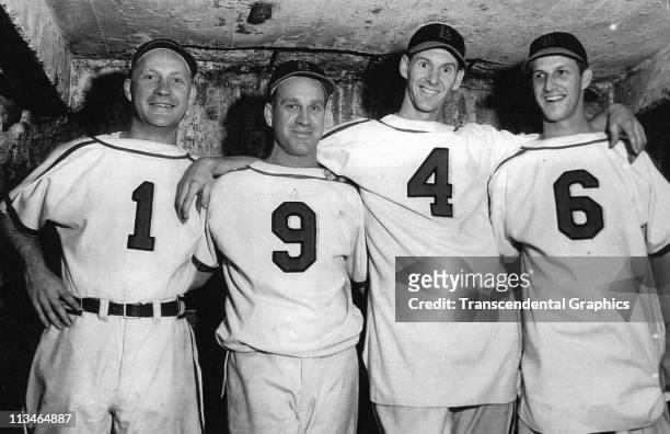 Whitey Kurowski, Enos Slaugher, Marty Marion and Stan Musial of St. Louis Cardinals pose for a portrait at Sportsmans Park on April, 1946 in St....