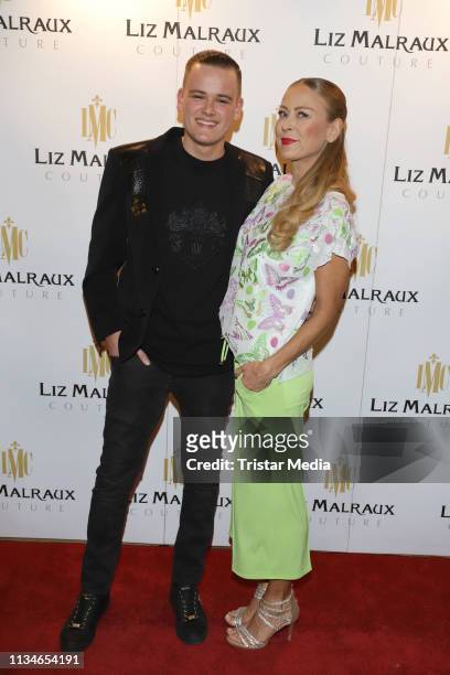 Paul Jolig and his mother Jenny Elvers during the Liz Malraux Fashion Show "Masterpieces Of Fashion Art" on March 8, 2019 in Hamburg, Germany.