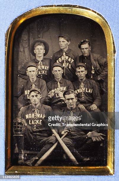 Tintype photograph shows the Norway Lake baseball team posing in a studio circa 1885 in Norway Lake, Maine.