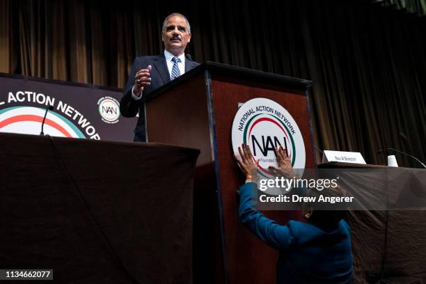 Former U.S. Attorney General Eric Holder speaks at the National Action Network's annual convention, April 3, 2019 in New York City. A dozen 2020...