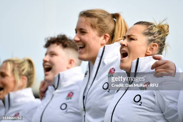 Marlie Packer of England and team mates sing the national anthems prior to the Womens Six Nations match between England and Italy at Sandy Park on...