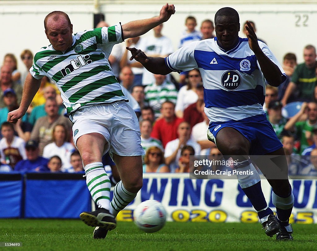 John Hartson of Celtic beats Daniel Shittu of Queens Park Rangers to score the third goal